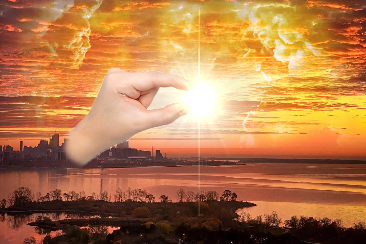 Sunrise with floating hand holding the sun